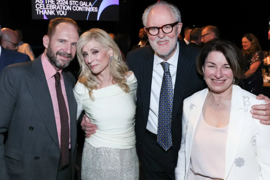 A group of celebrities take a photo at a gala event. 