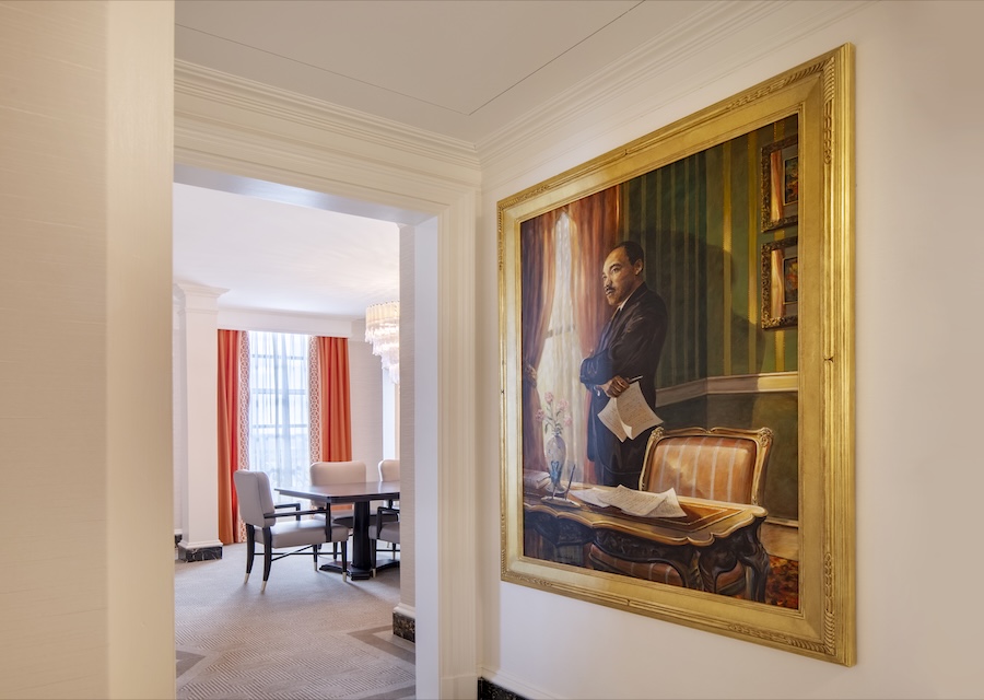 A framed portrait of Martin Luther King Jr hangs near the entrance to a suite inside the Willard InterContinental.