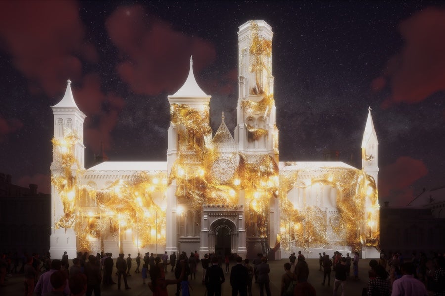 Illuminated castle at night with golden lights and crowd in silhouette