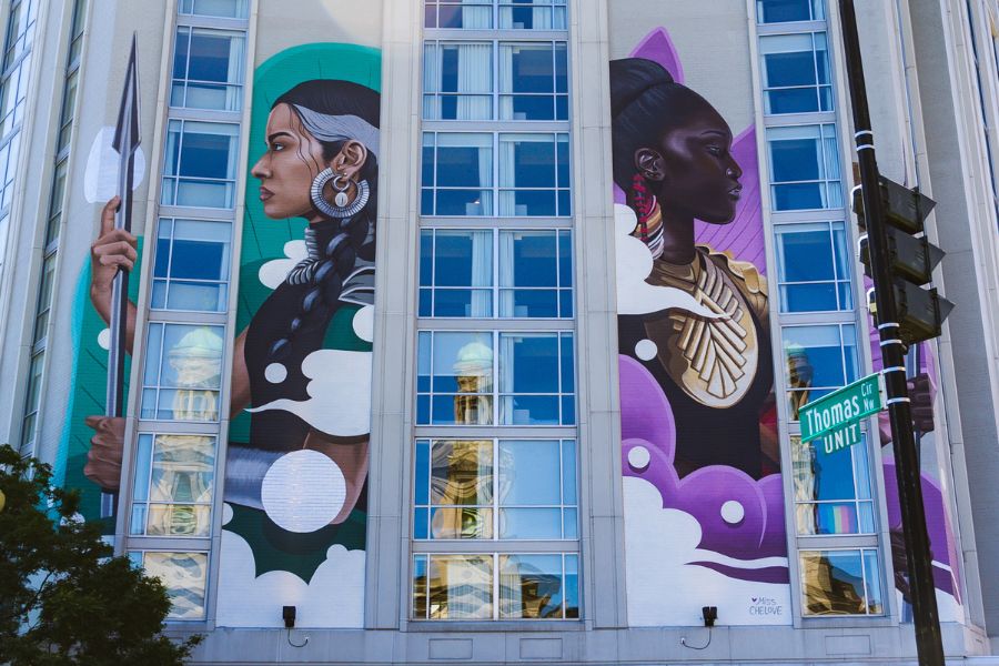 Guardians of the Four Directions mural on Hotel Zena