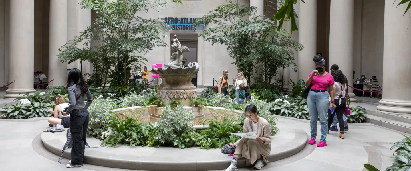 Visitors gather around a fountain in the National Gallery of Art’s Sculpture Garden courtyard in Washington, DC.